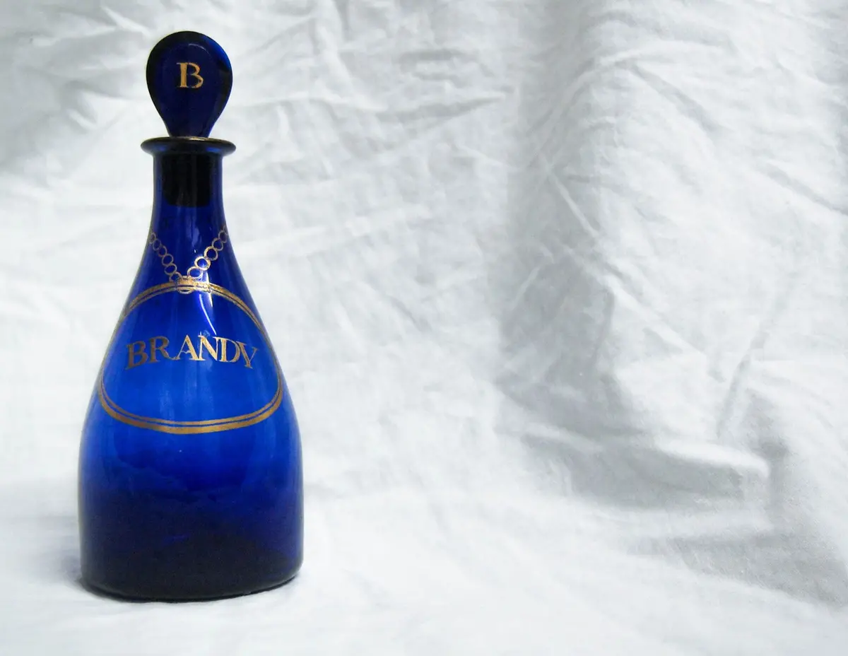 Georgian Bristol Blue Glass Club Shaped Brandy Decanter With Applied Gilt Lettering 1
